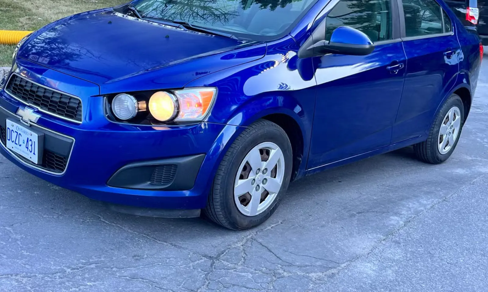 2013 Chevy Sonic — front 3/4